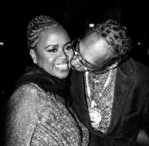 Snoop Dogg planting kiss on the cheeks of his beautiful wife Shante Taylor.
